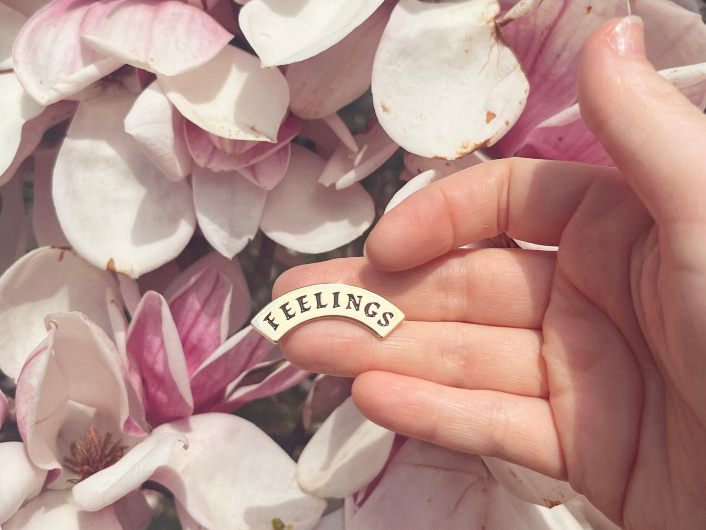 feelings enamel pin