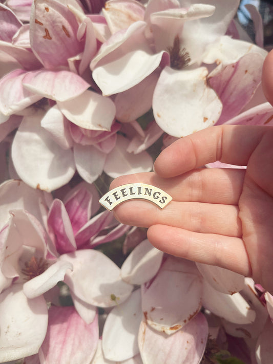 feelings enamel pin